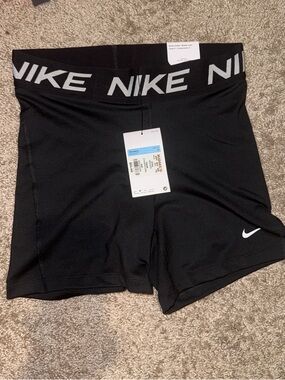Nike Black Athletic Shorts with White Logo Print